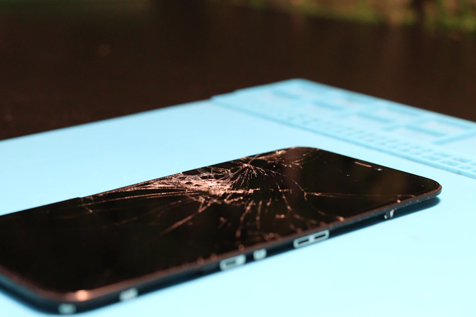 Cracked smartphone screen awaiting assessment