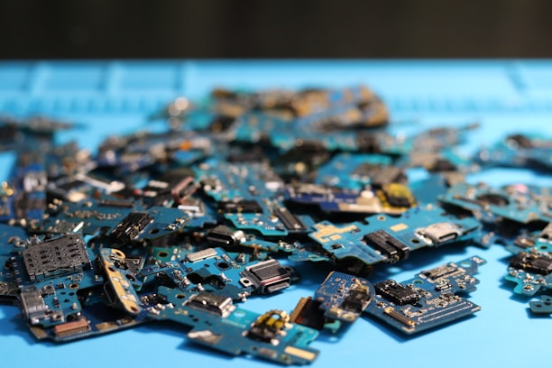Electronic circuit boards piled together.