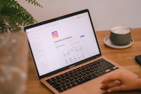 Instagram is open on a laptop screen.