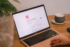 Instagram is open on a laptop screen.