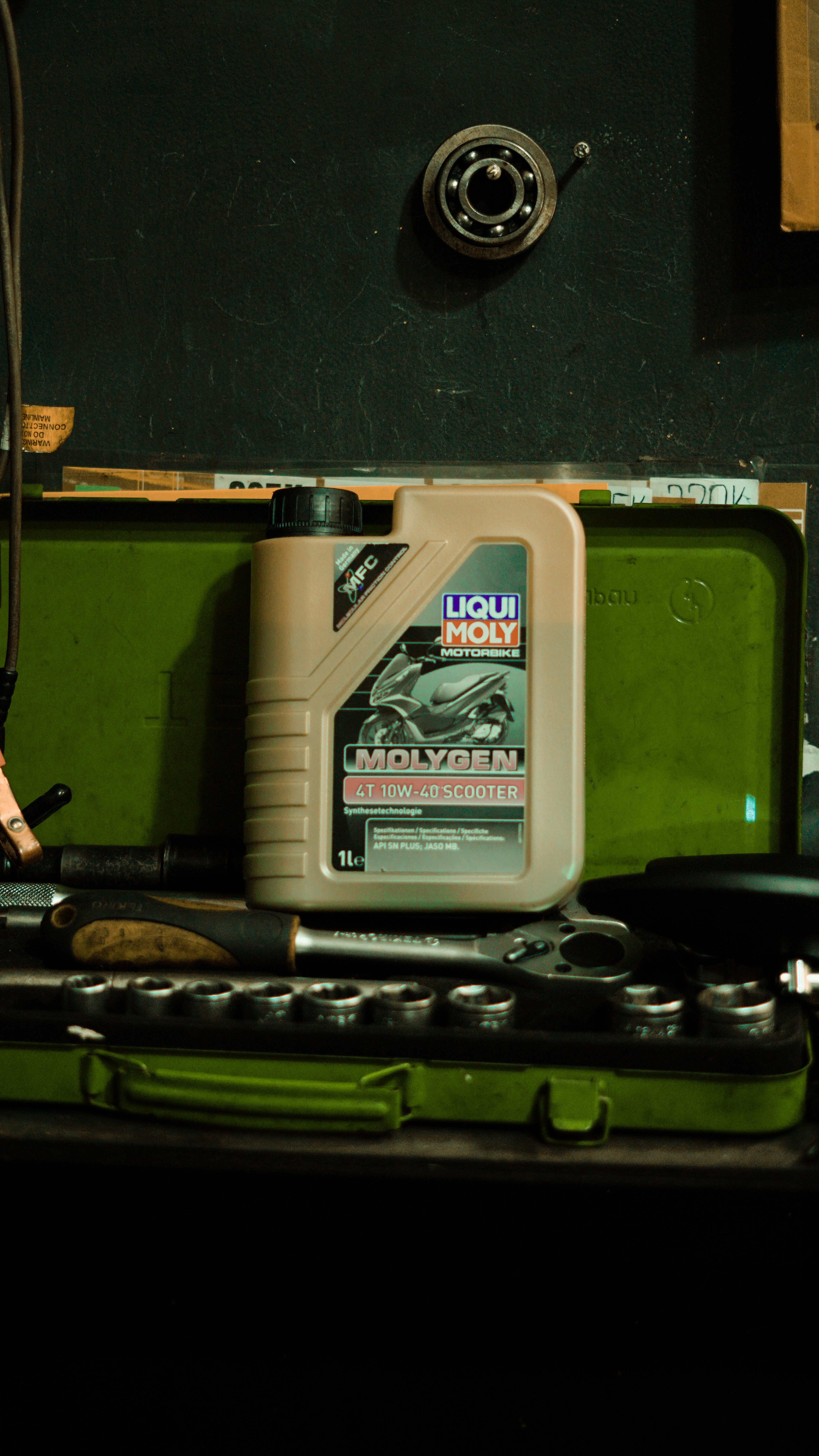 Liqui moly oil bottle and tools.