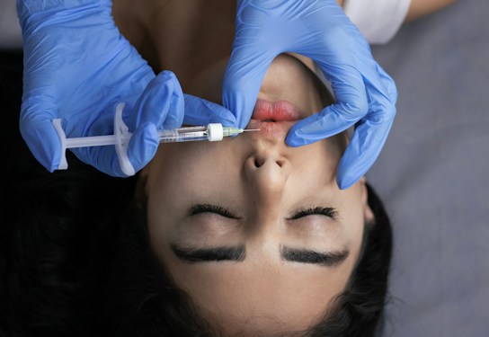 Dermal filler being administered in a clinic