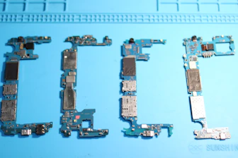 Phone circuit boards are arranged to spell a word.