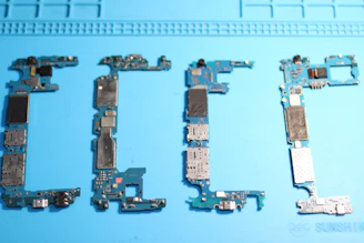 Phone circuit boards are arranged to spell a word.