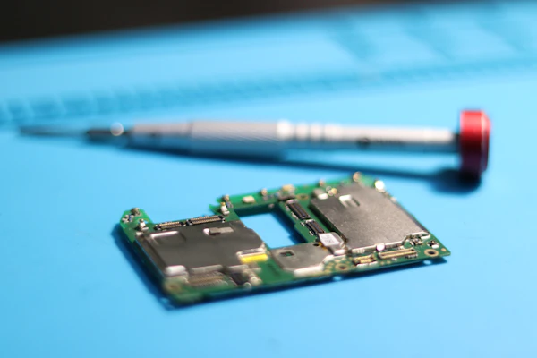 Certified technician performing hands-on repair work