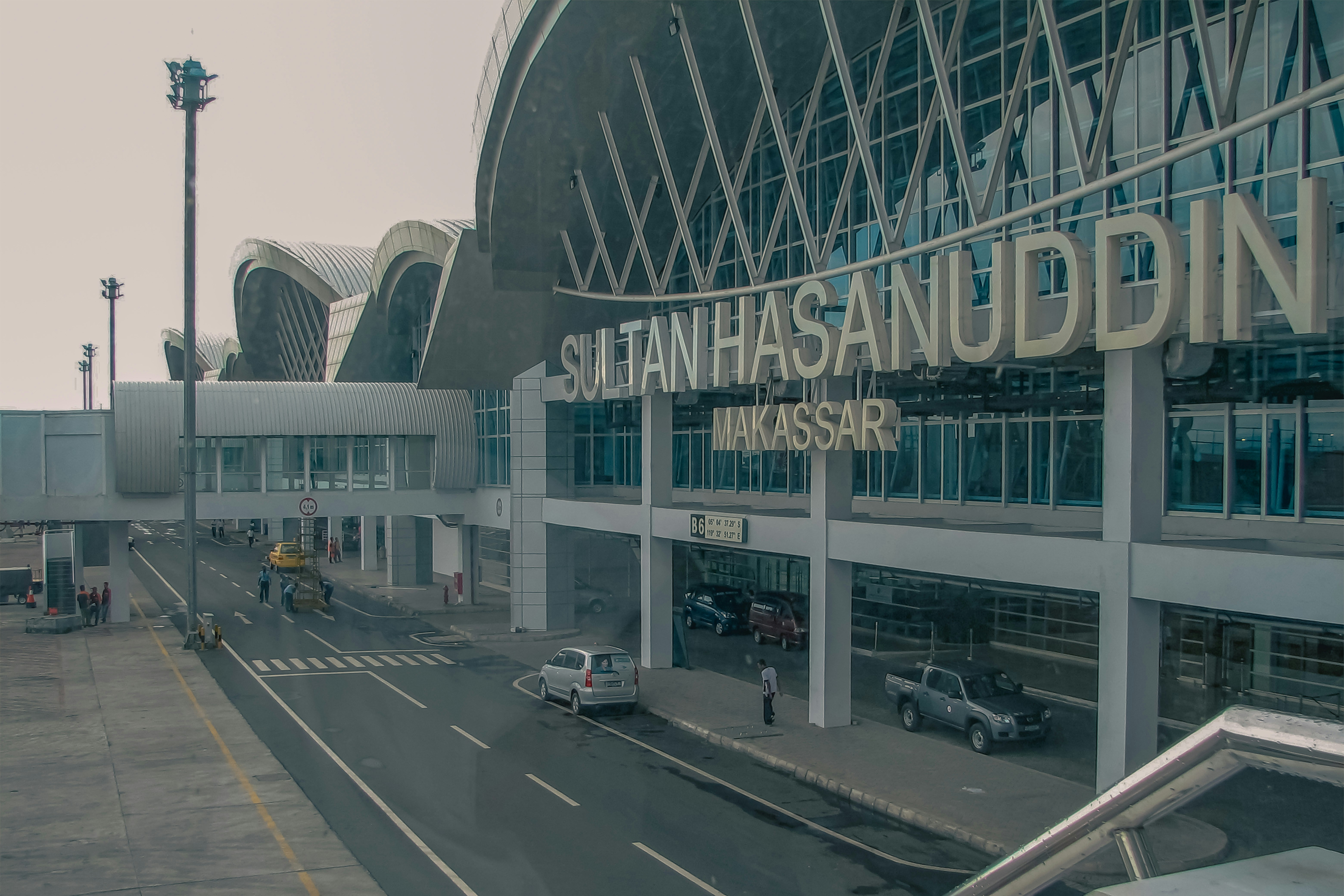 The image depicts the sultan hasanuddin airport.