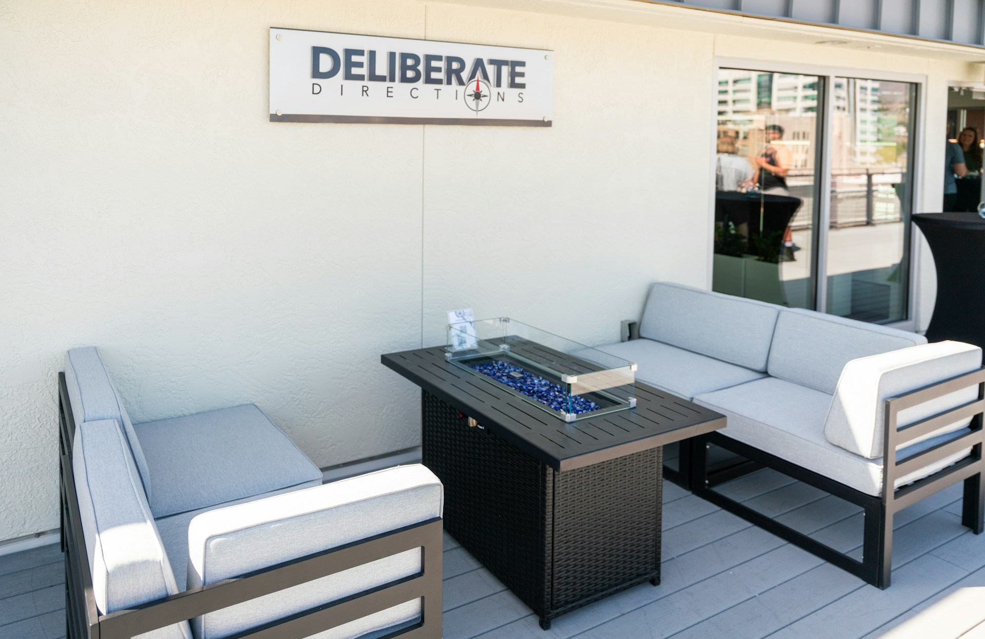 Outdoor seating area with a fire pit.