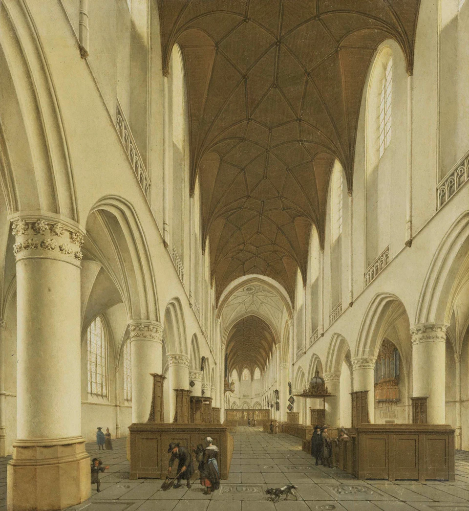 The image depicts a large, ornate church with high ceilings and arched windows that allow natural light to filter into the space. The walls are painted white, providing a stark contrast to the dark wooden floor beneath. Several people can be seen walking around the church, some closer to the foreground while others are further back in the scene.

The church features numerous columns supporting the roof and arches on either side of the room, adding to its grandeur. The perspective of the image is from the ground level, looking up at the towering architecture, emphasizing the scale and majesty of the space.