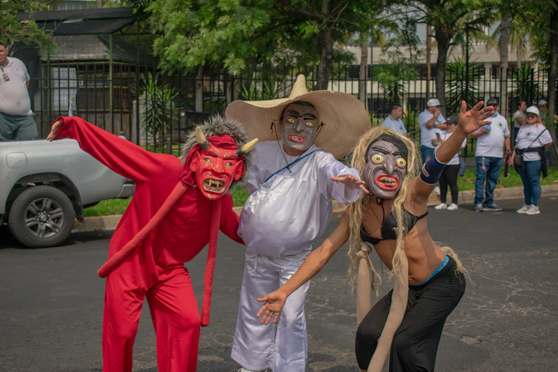 Dancers in costume pose for a photo