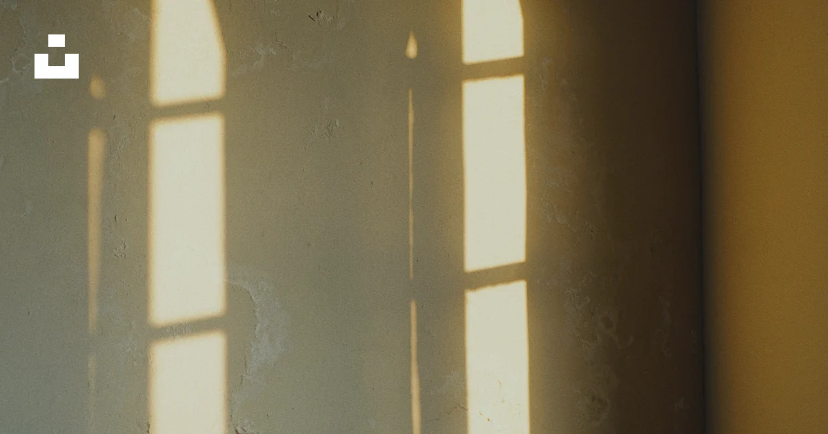 Window Shadow Glass Rèlect Shadows of arched windows reflect on a wall. photo – Free Sun Image on ...