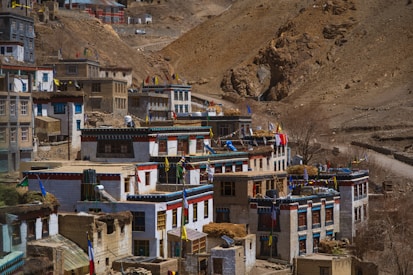 Houses and buildings are in a mountain village.