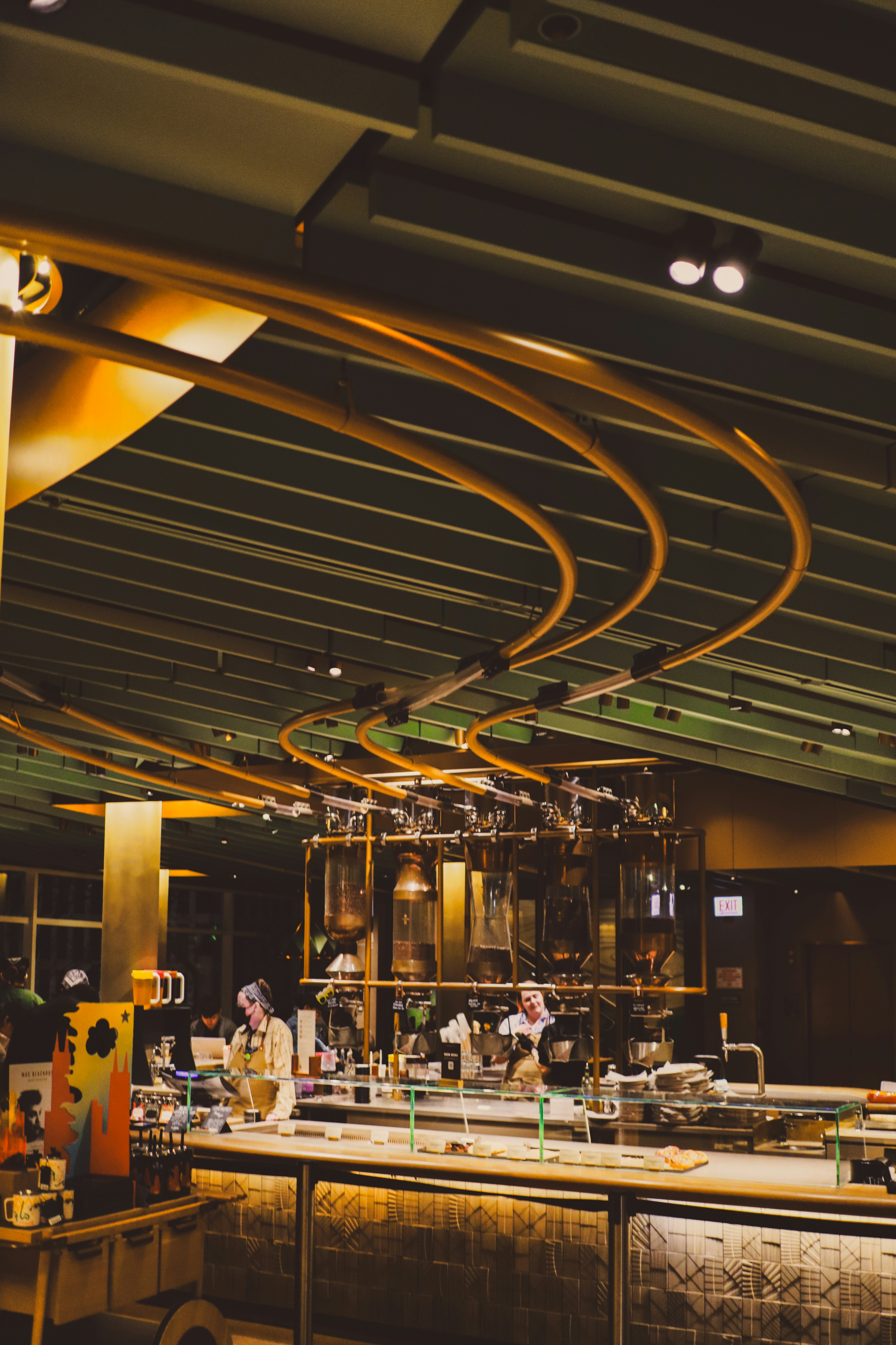 A stylish starbucks interior with golden design.