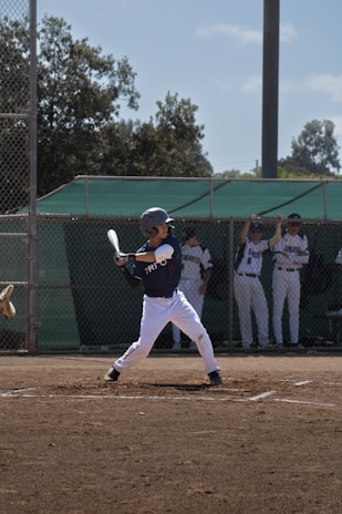 A baseball player is ready to bat.