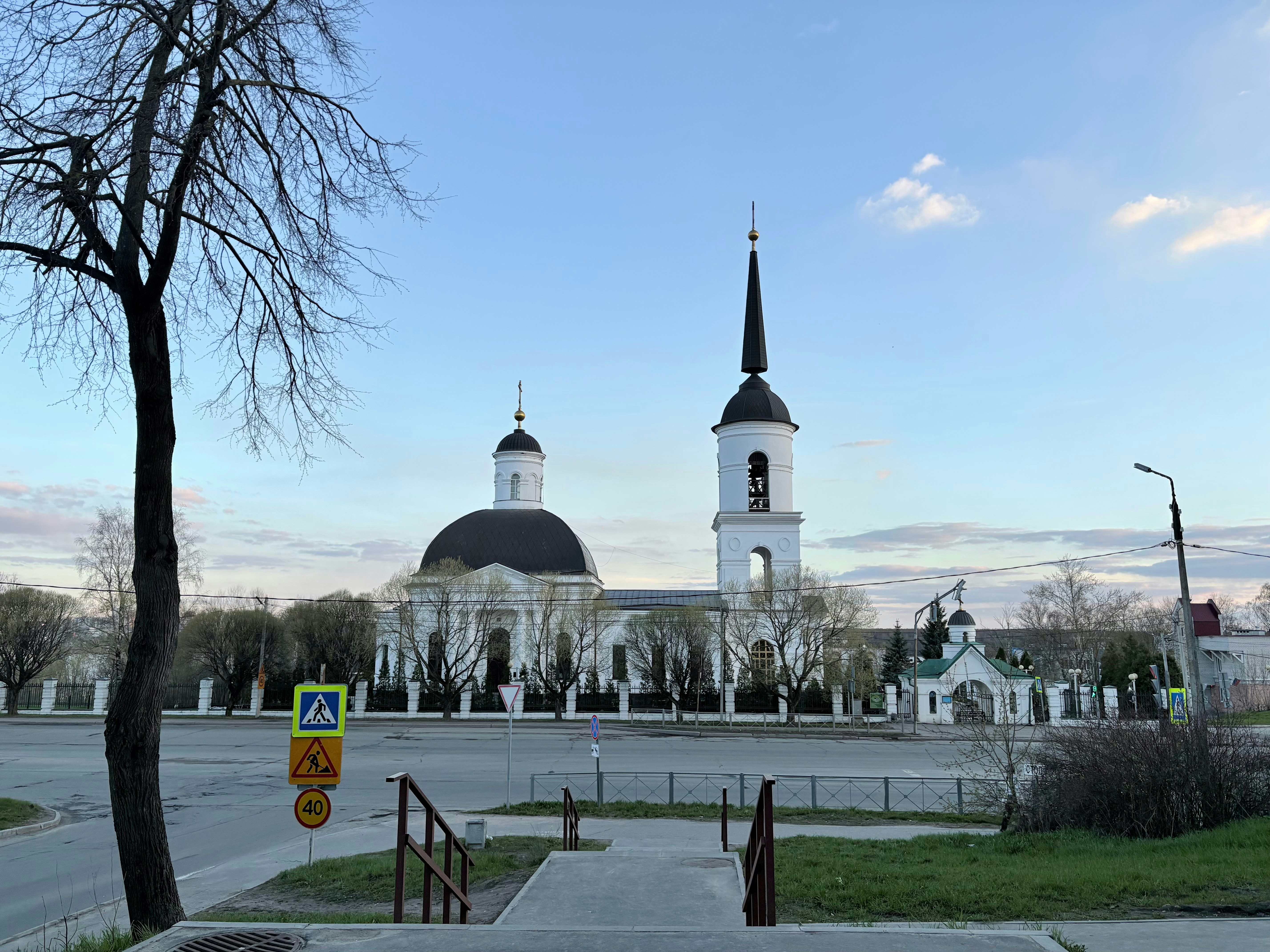 A grand church stands in an empty plaza.