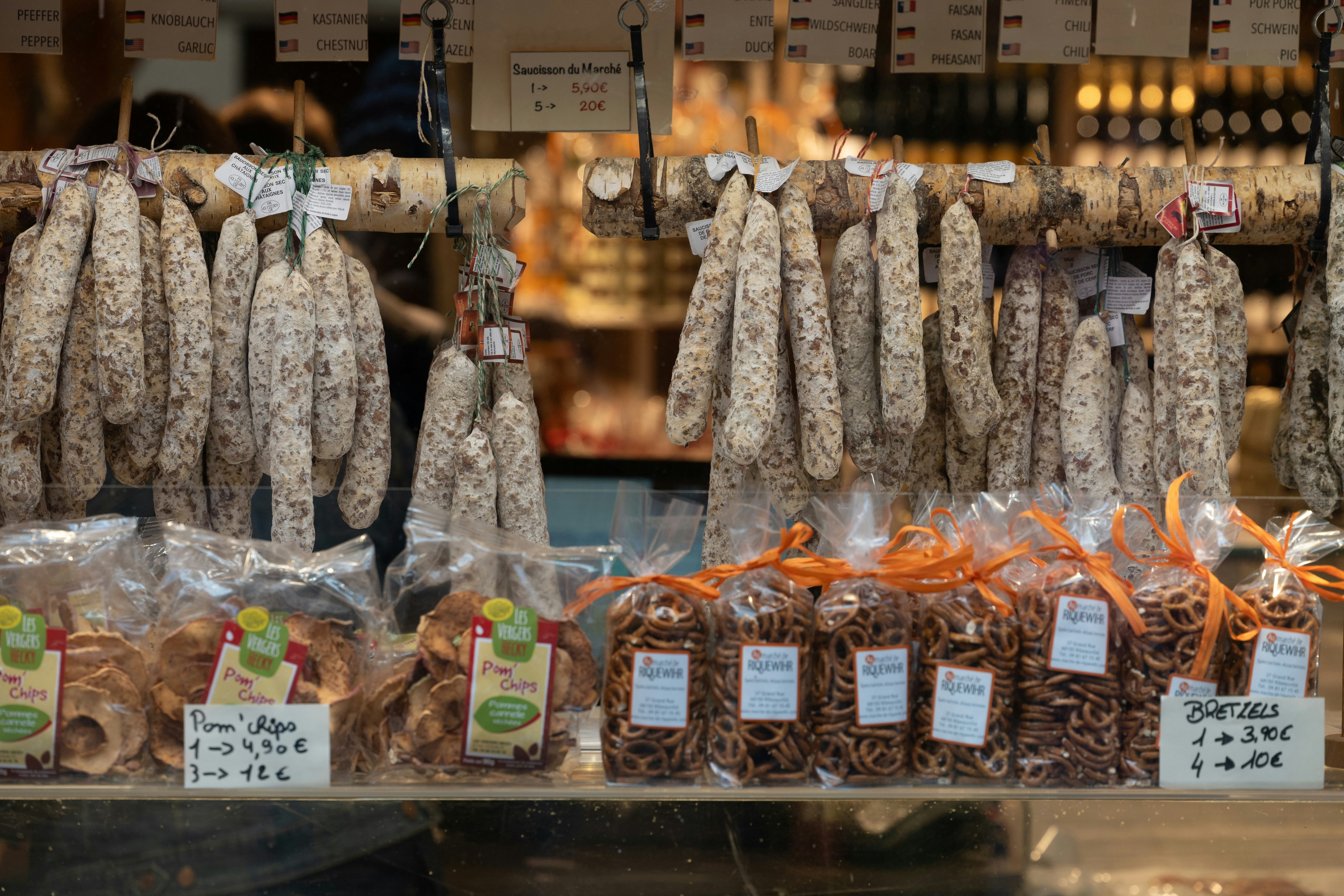 Sausages and packaged goods are on display.