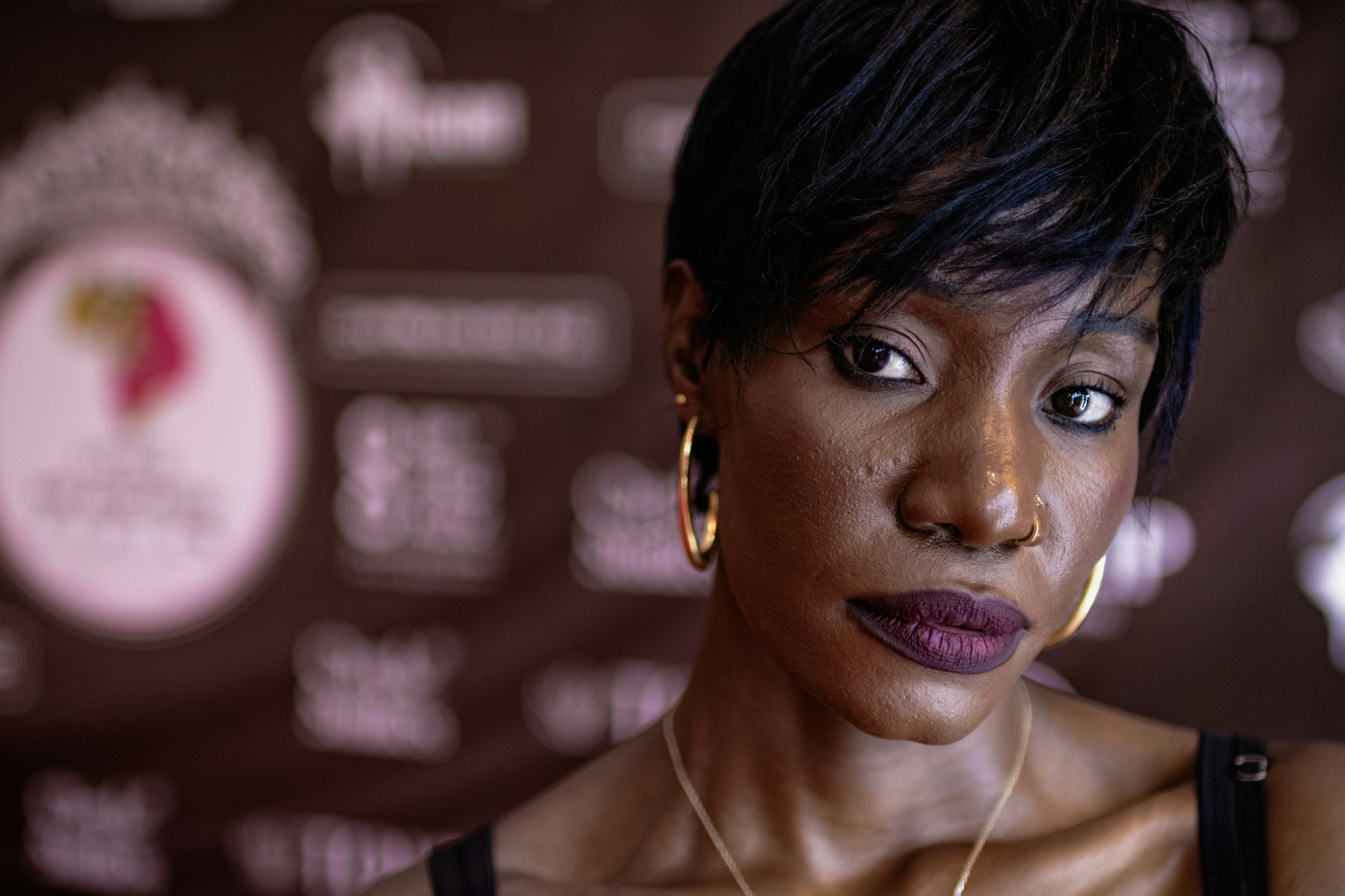 Ugandan woman wearing gold earrings