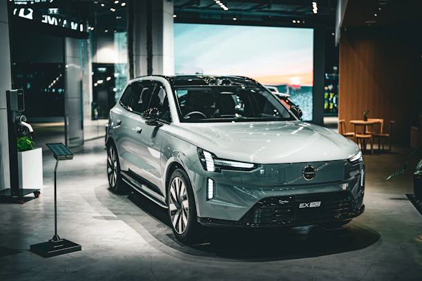 A sleek volvo suv is showcased in an indoor setting