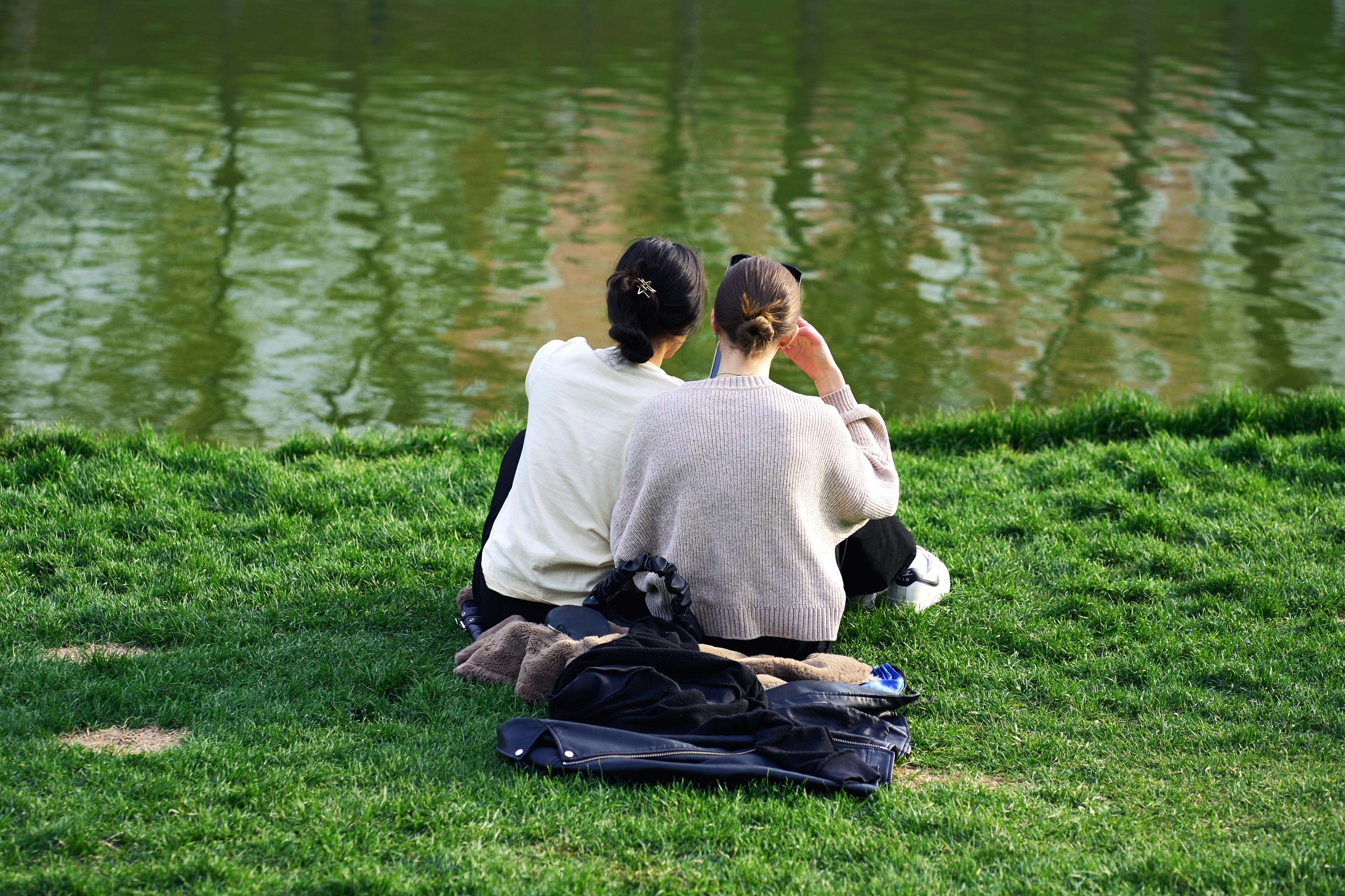 Two women by lake