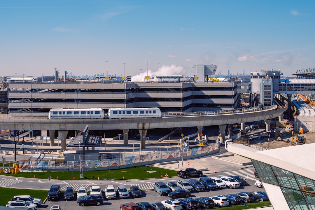 A train travels along an airport rail line.