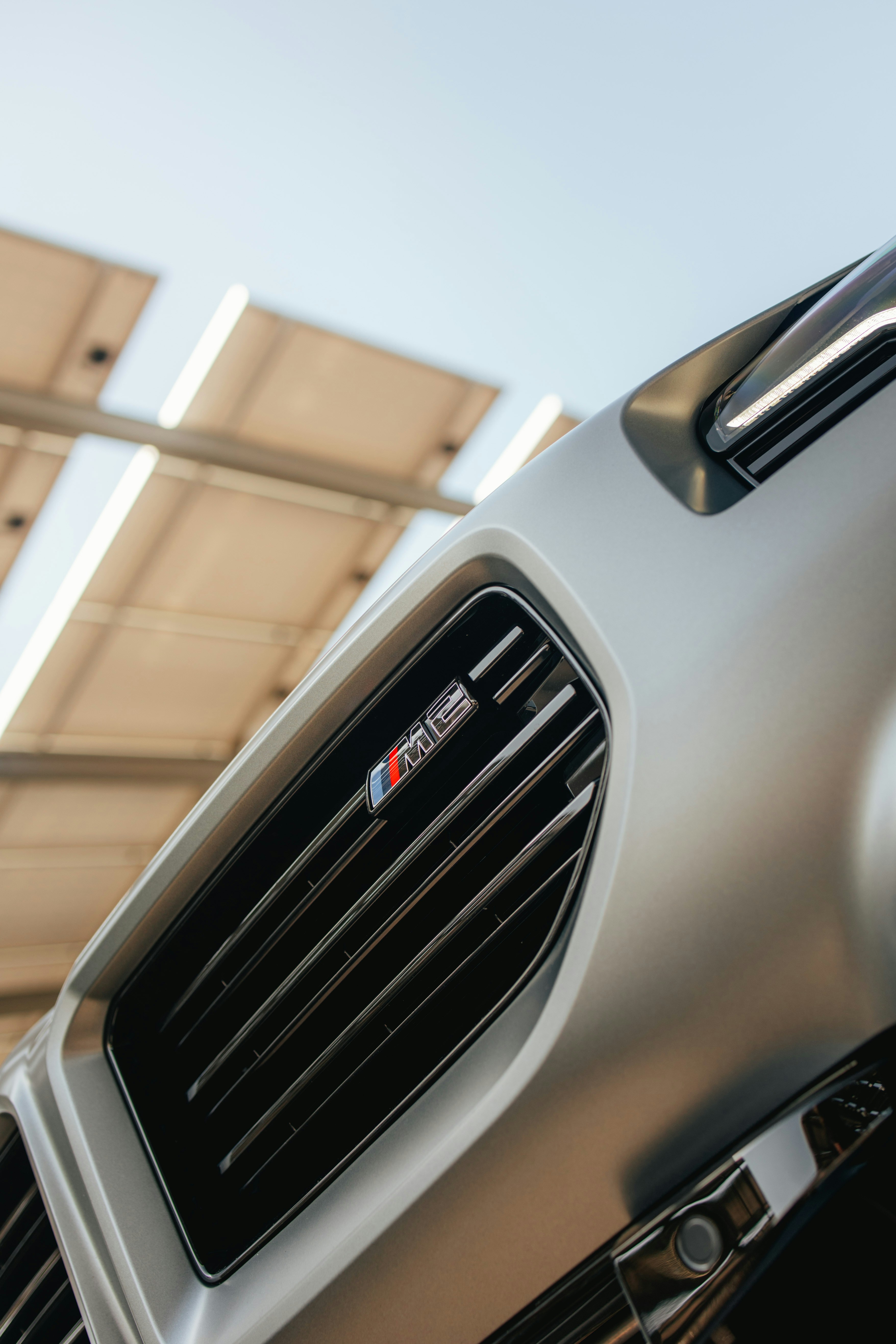 BMW m5 badge on a silver car.