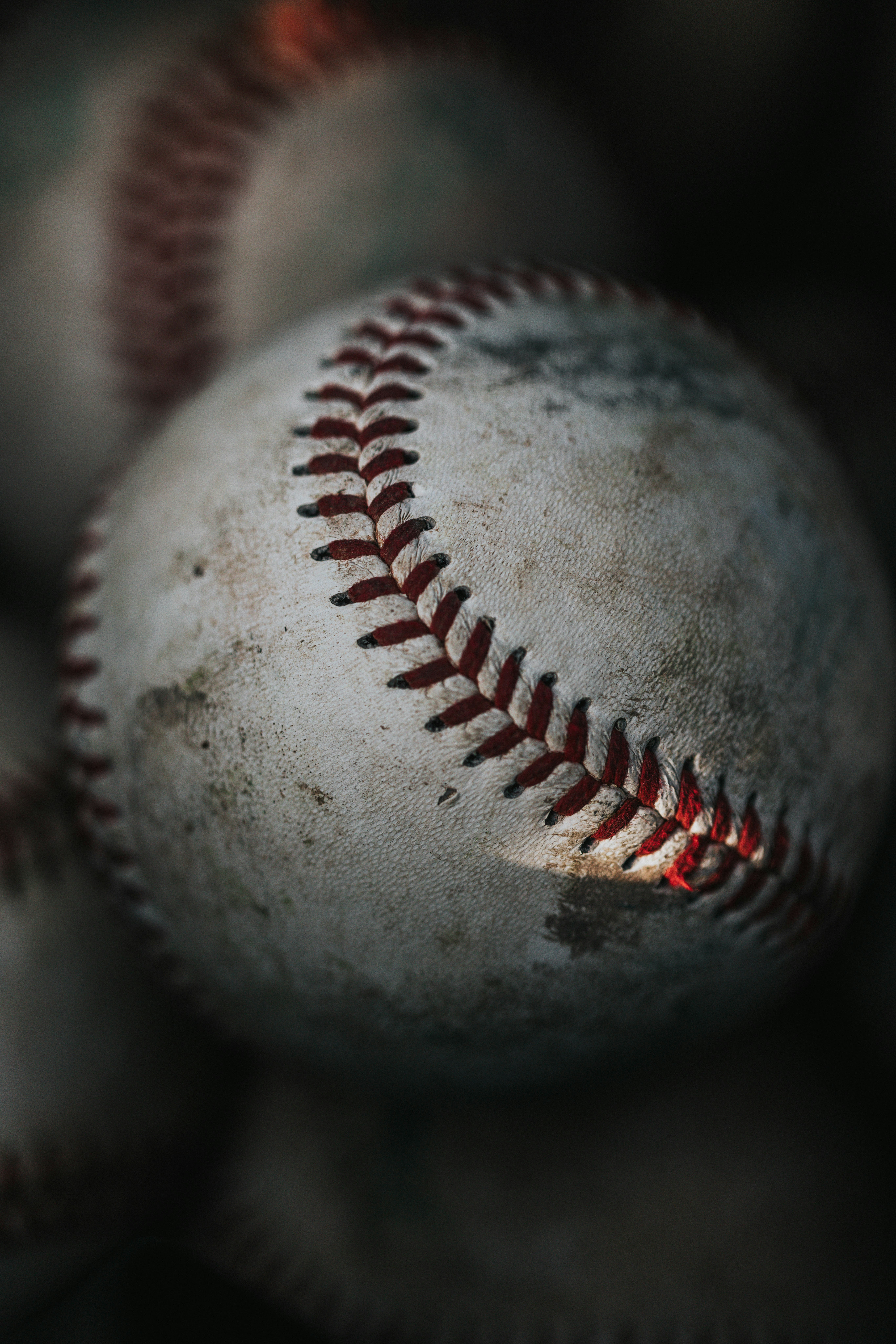 A close-up shot of a baseball and others.