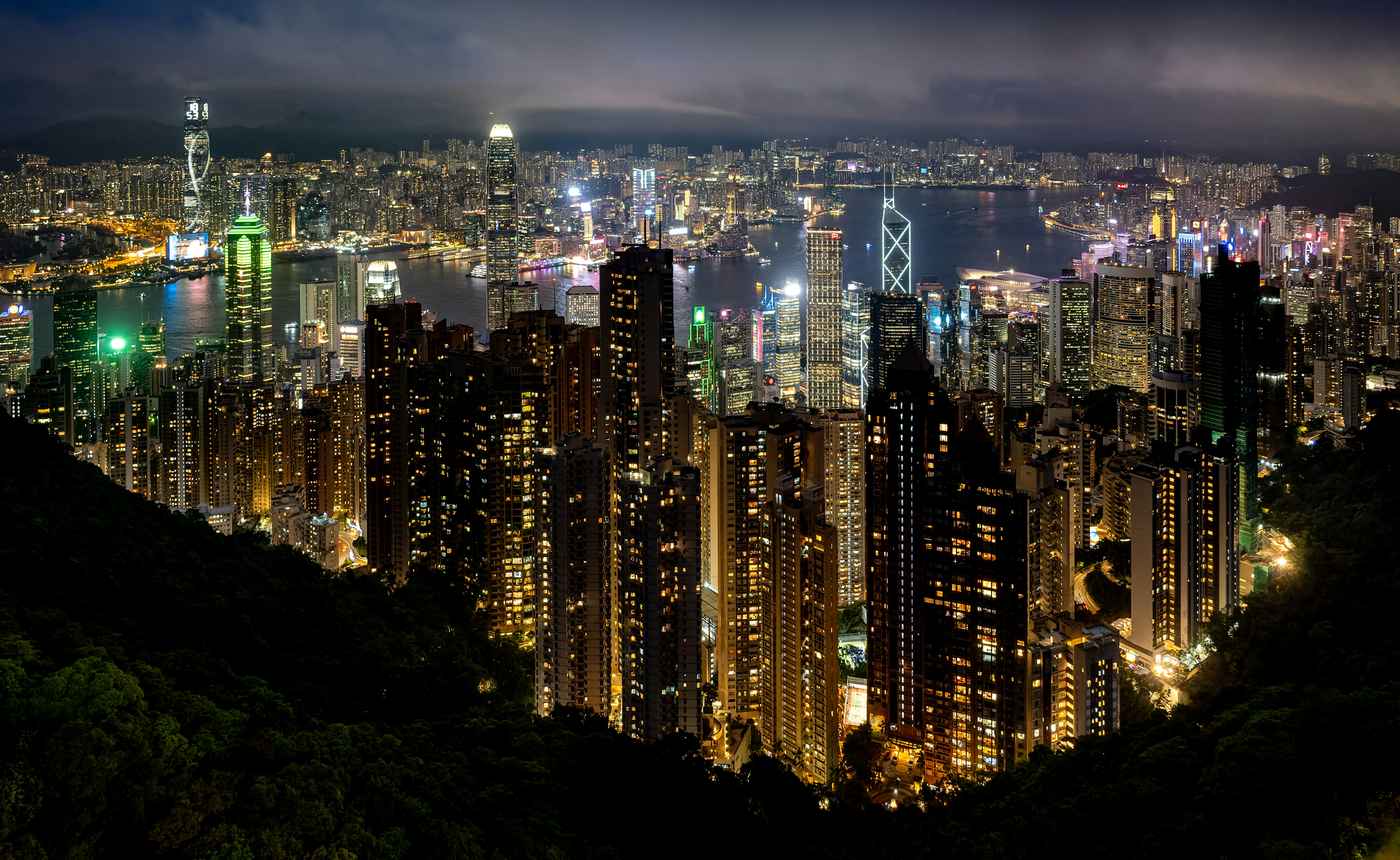 A nighttime view of a lit-up city.