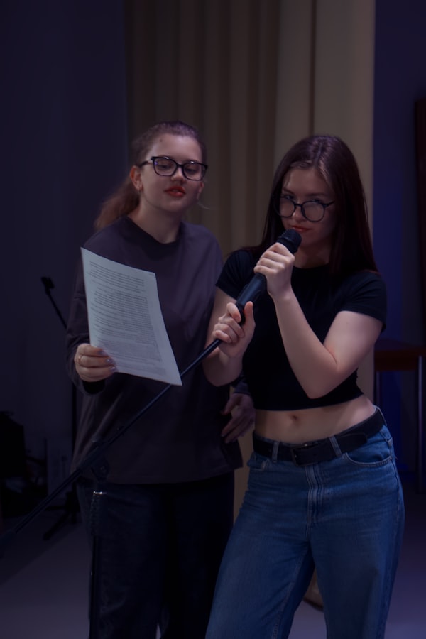 Two women performing karaoke together