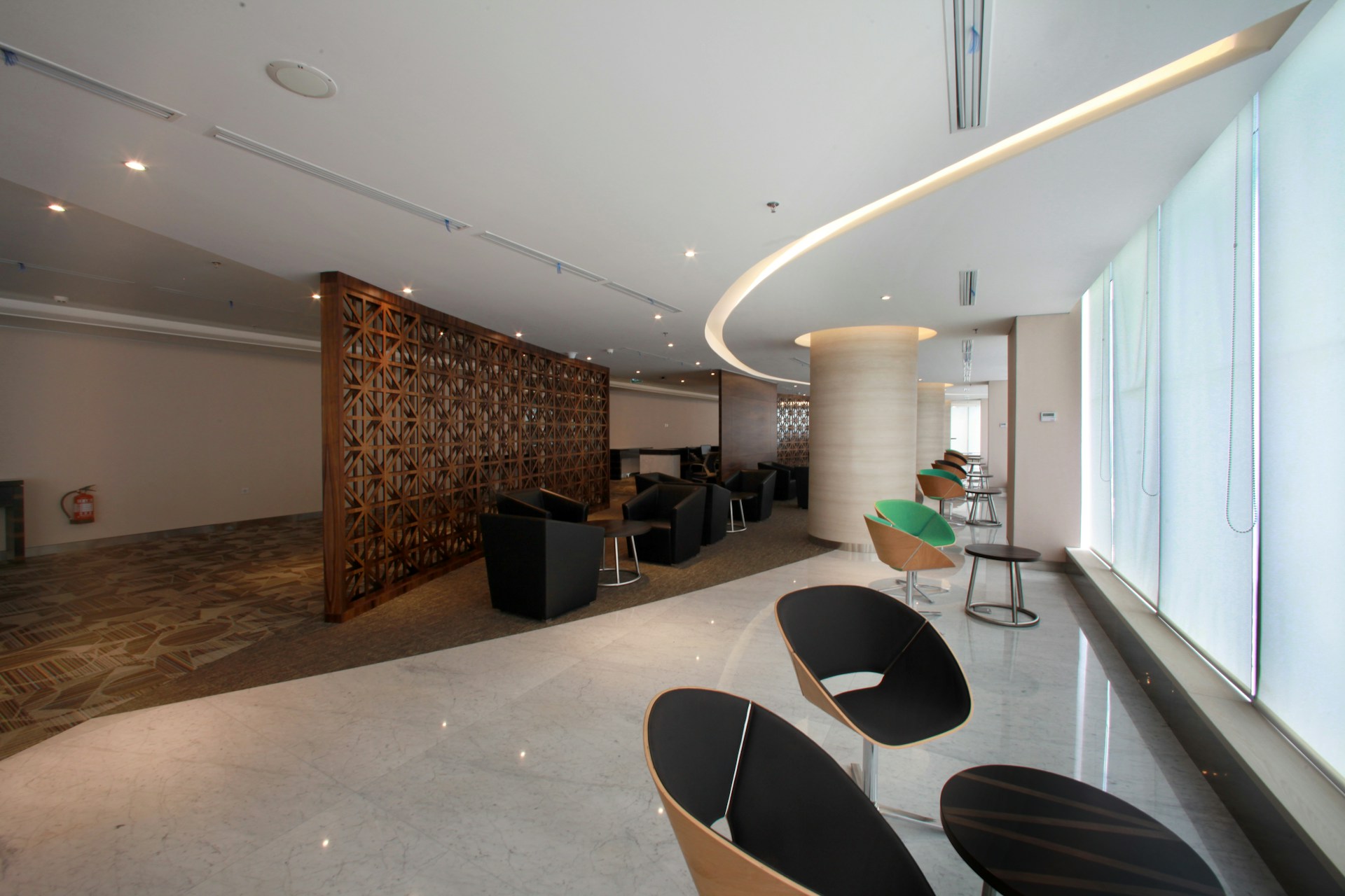 A modern waiting area with stylish chairs and details.