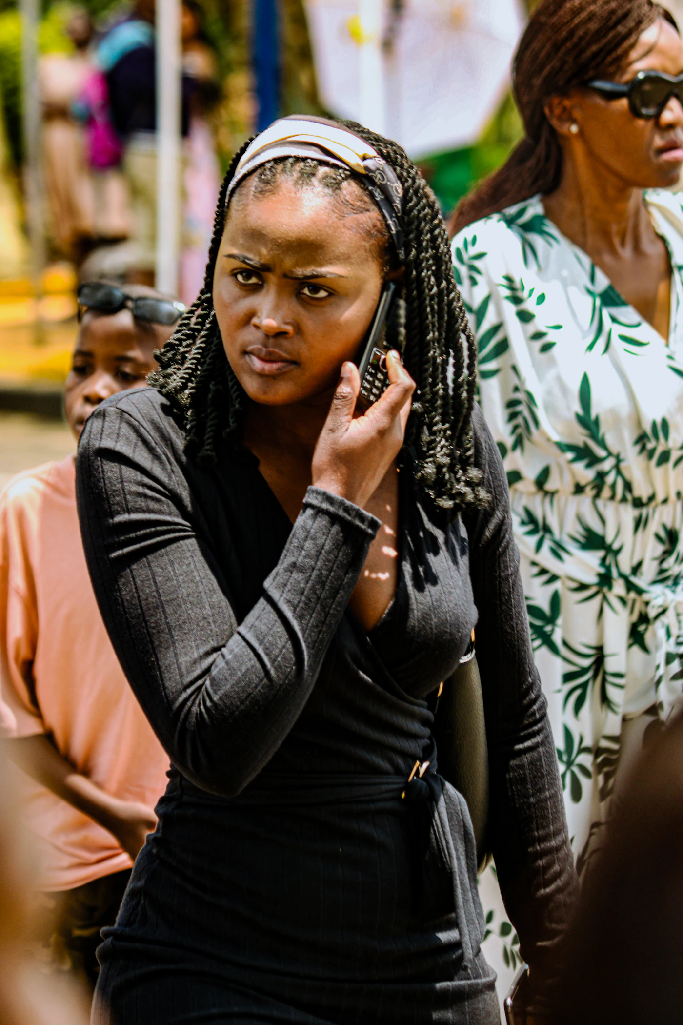 Young woman talking on a cell phone outdoors