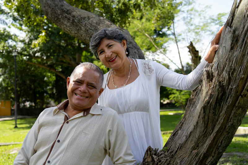 smiling mature couple posing outdoors