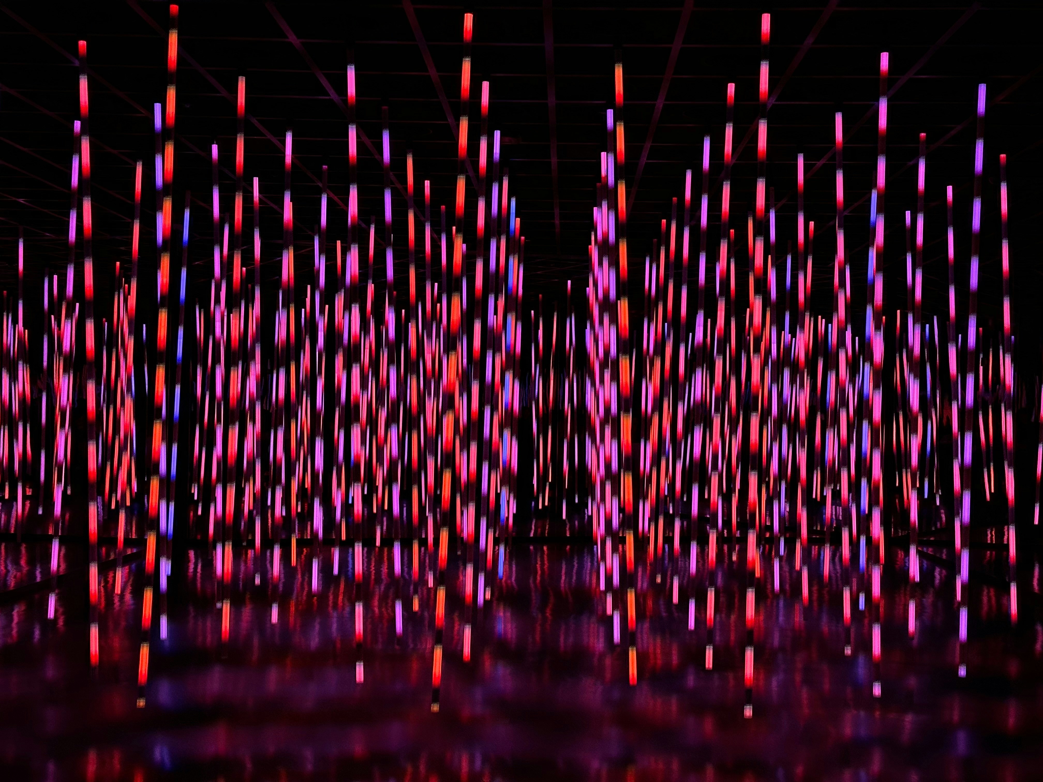 Abstract light display featuring vertical lines.