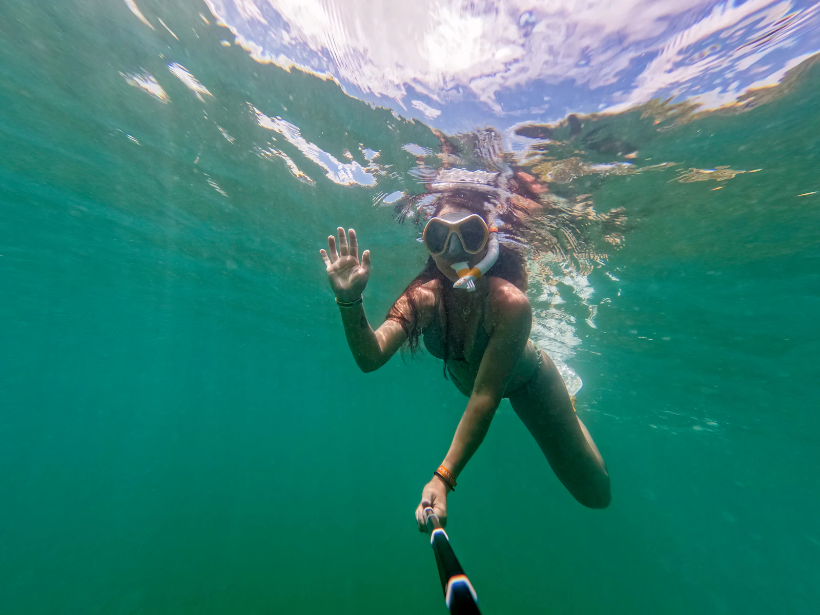 Snorkeling in clear turquoise Caribbean water