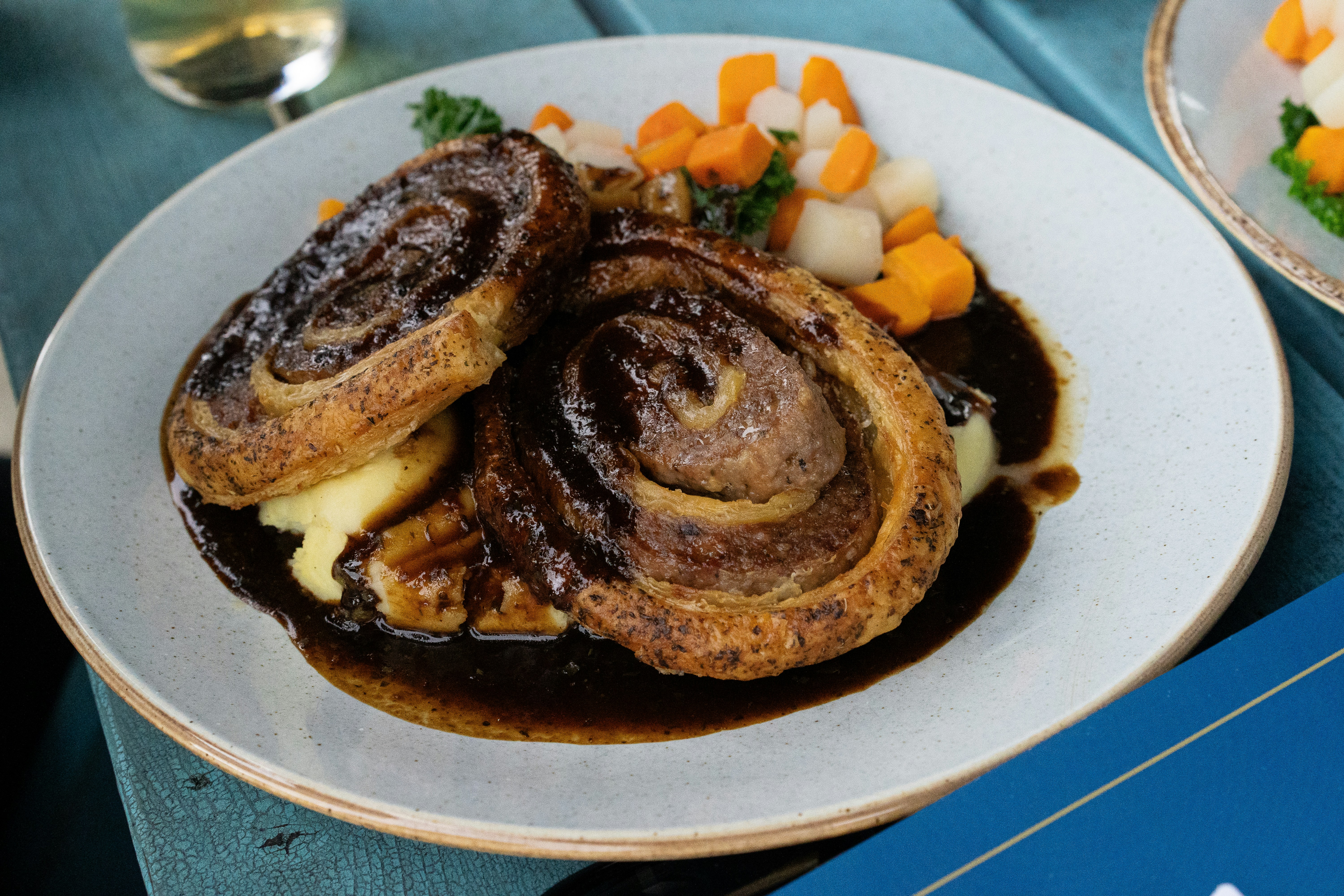 Savory meat dish with sauce and vegetables