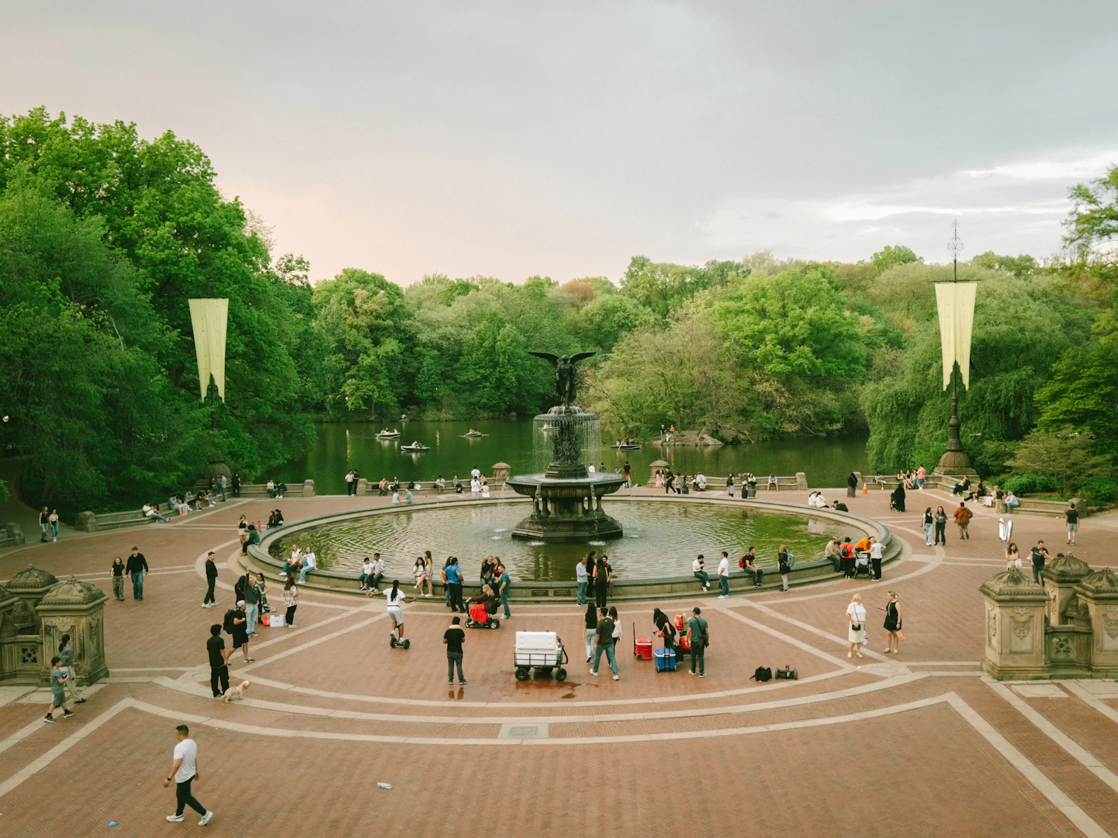Travel photograph: Bethesda Fountain and Terrace opening towards the lake and spring-green trees in Central Park.