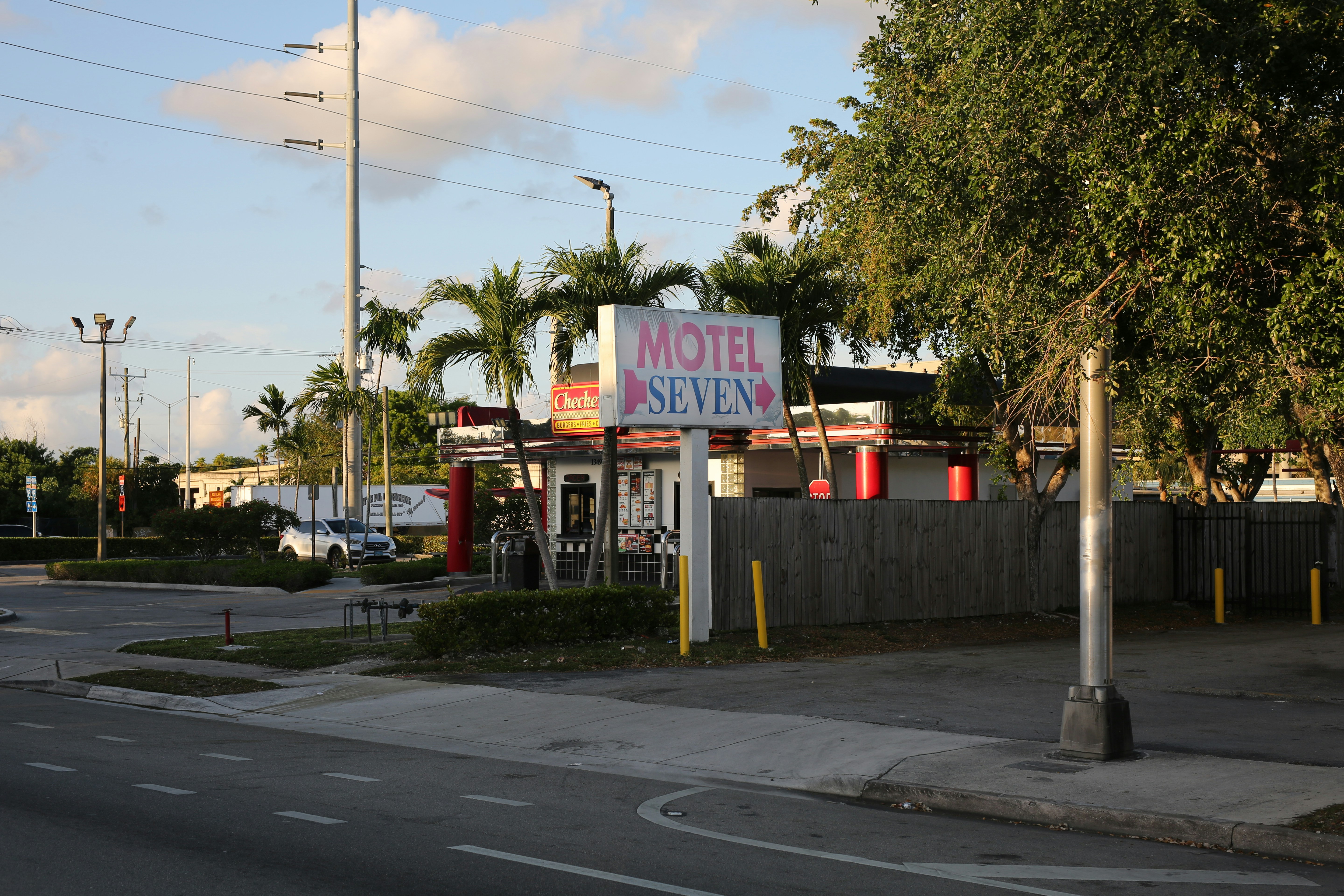 Motel seven stands by the road.