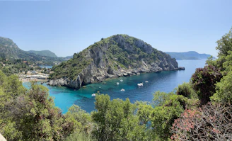 Beautiful turquoise water and a rocky island.
