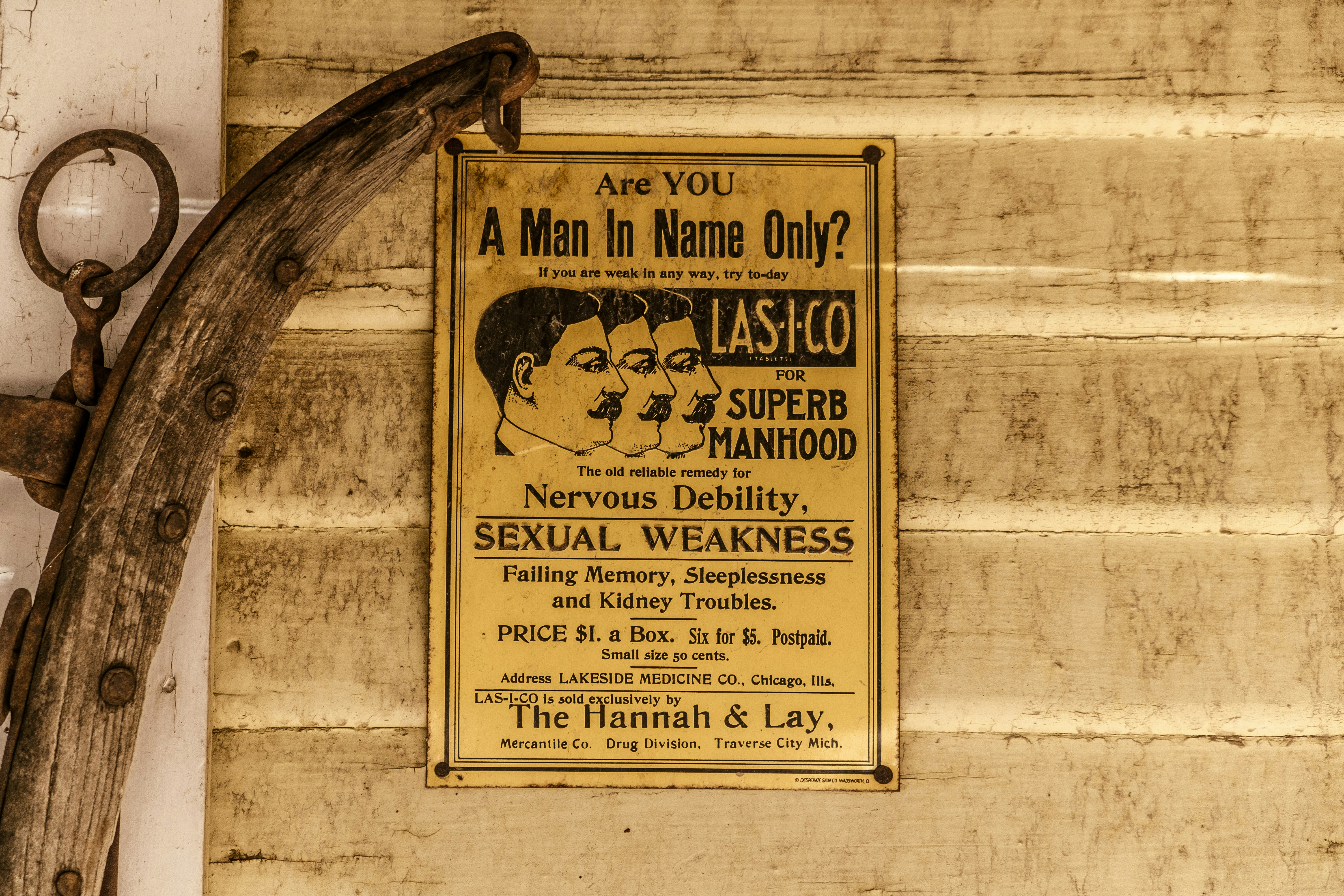 An old advertisement promises "superb manhood" for men.