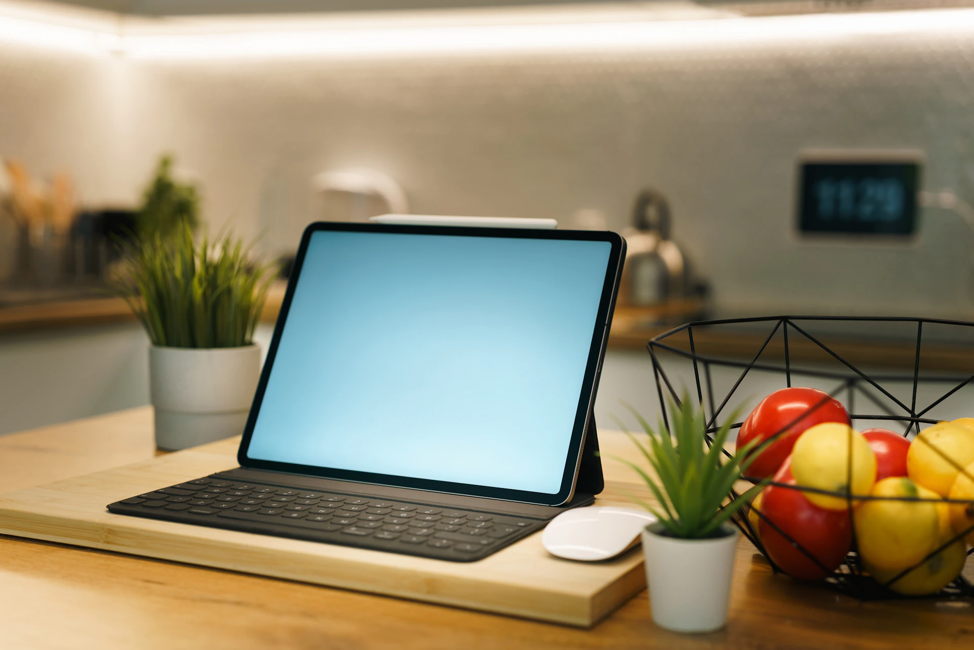 A tablet sits on a kitchen counter.