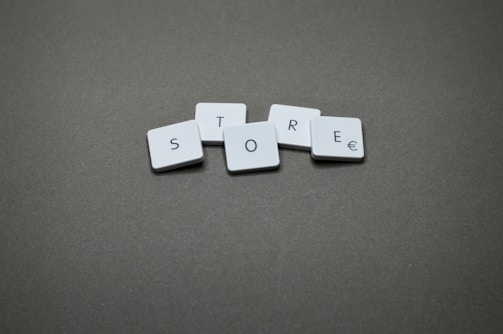 The word "store" is spelled with tiles.