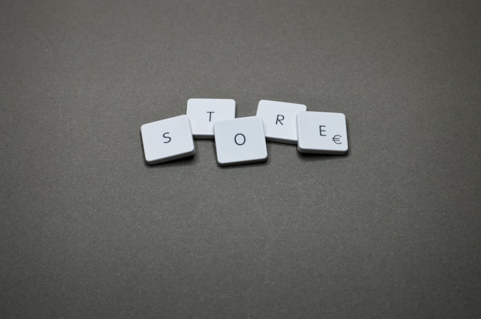 The word "store" is spelled with tiles.