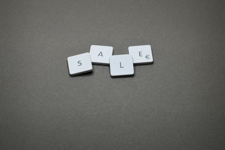 Sale spelled out with letter tiles