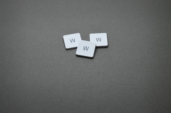 Three tiles with the letter "w" on them.