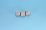 Keyboard keys spell out the word "web."