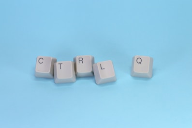 Keyboard keys spell "ctrl q".