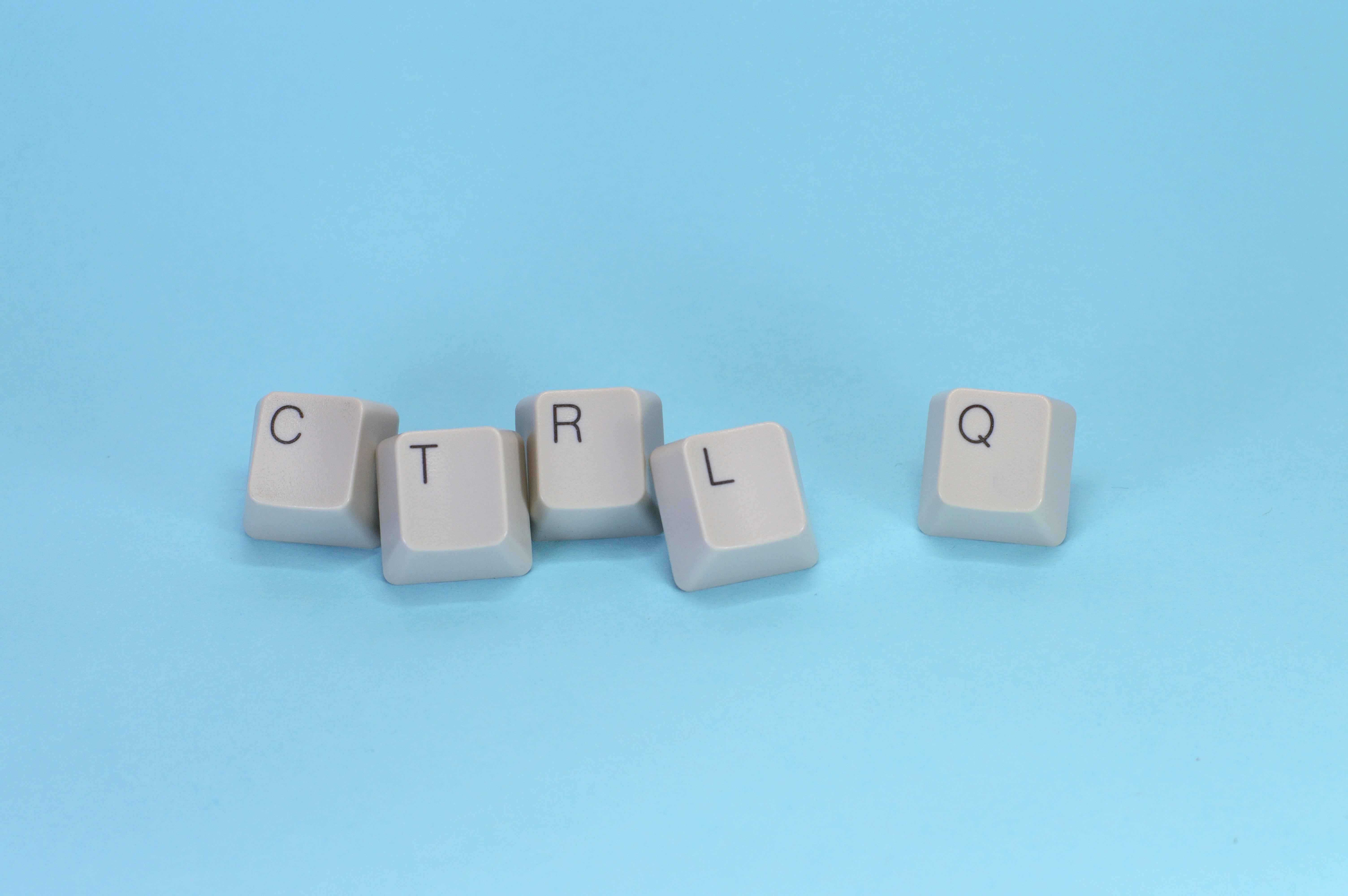 keys on blue background ctrl q