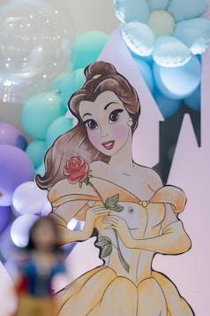 Belle holds a rose at a party.