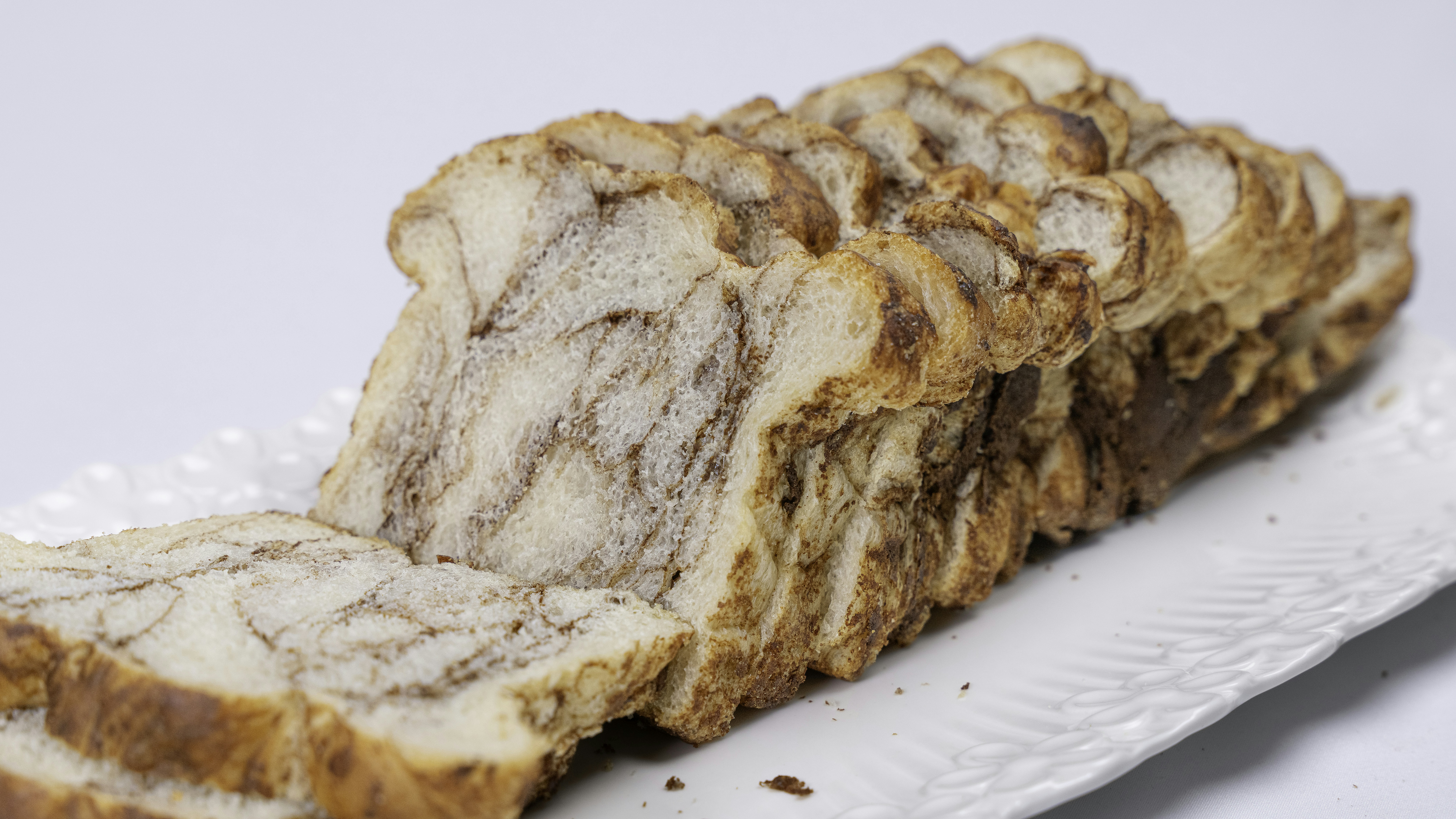 Sliced cinnamon swirl bread is ready to eat.