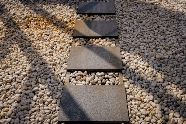 Stone paver walkway through garden