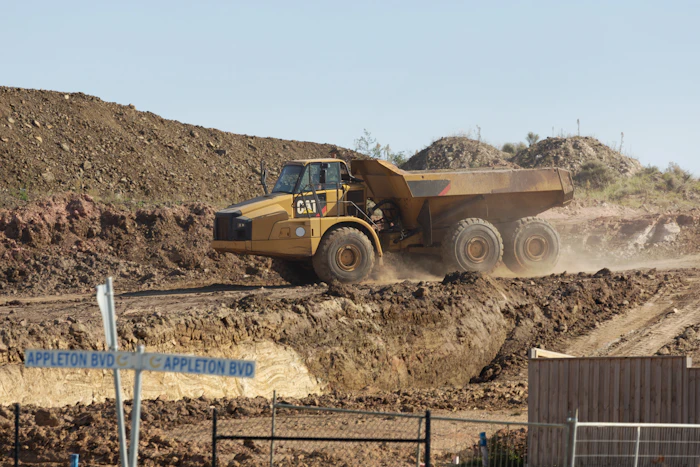 Six-wheel dump truck at a construction site