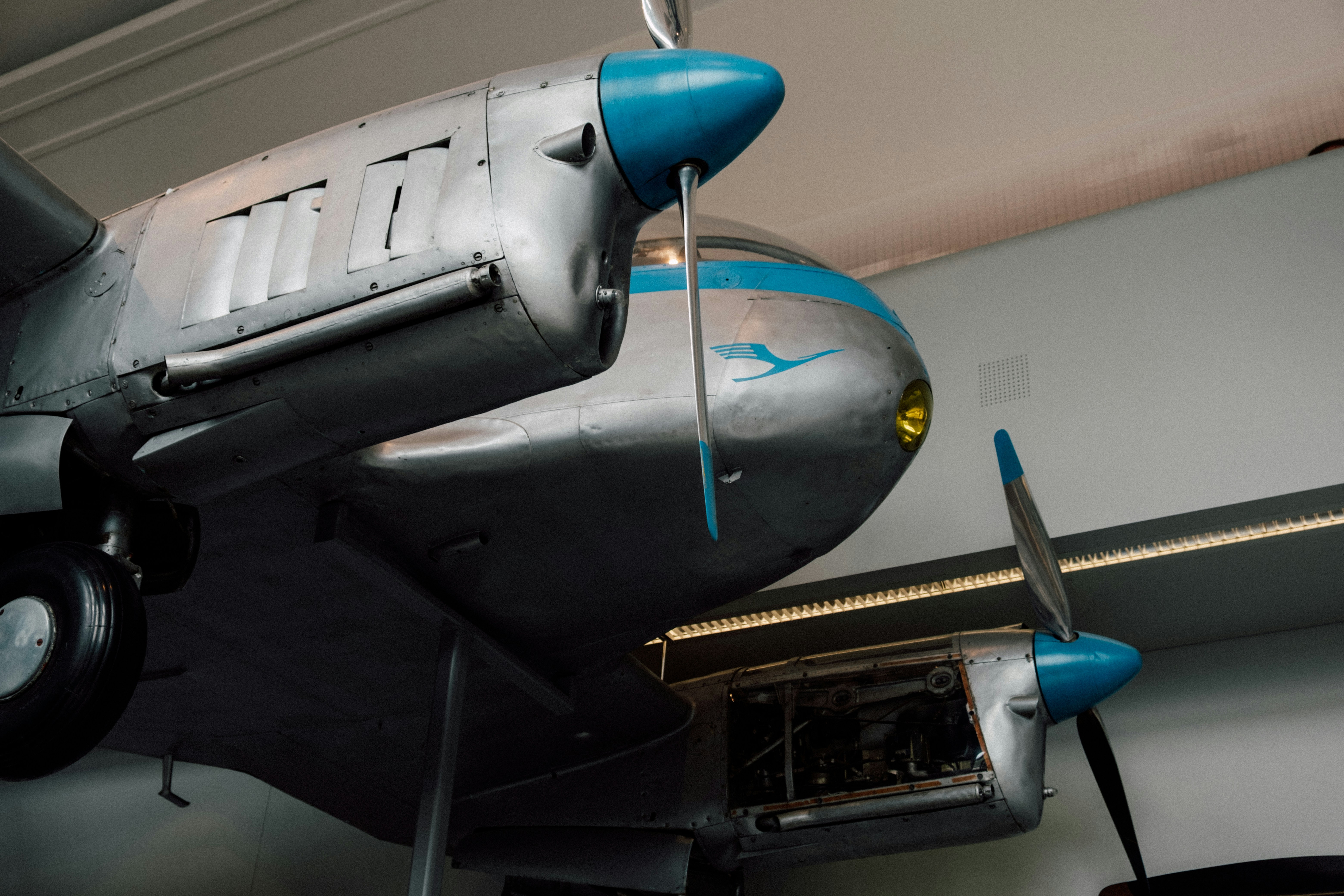 An antique airplane displayed in a museum.